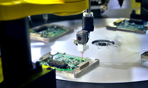 Photo production electronics assembly with robot