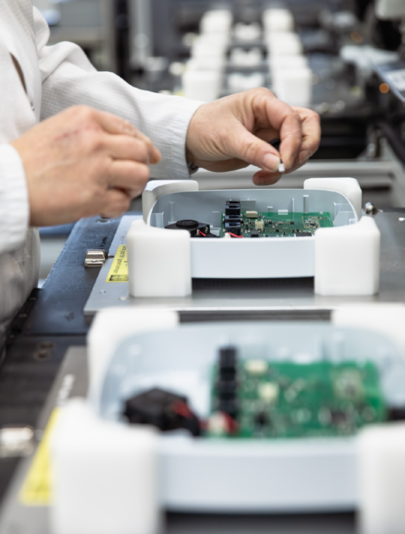 Production line with hands